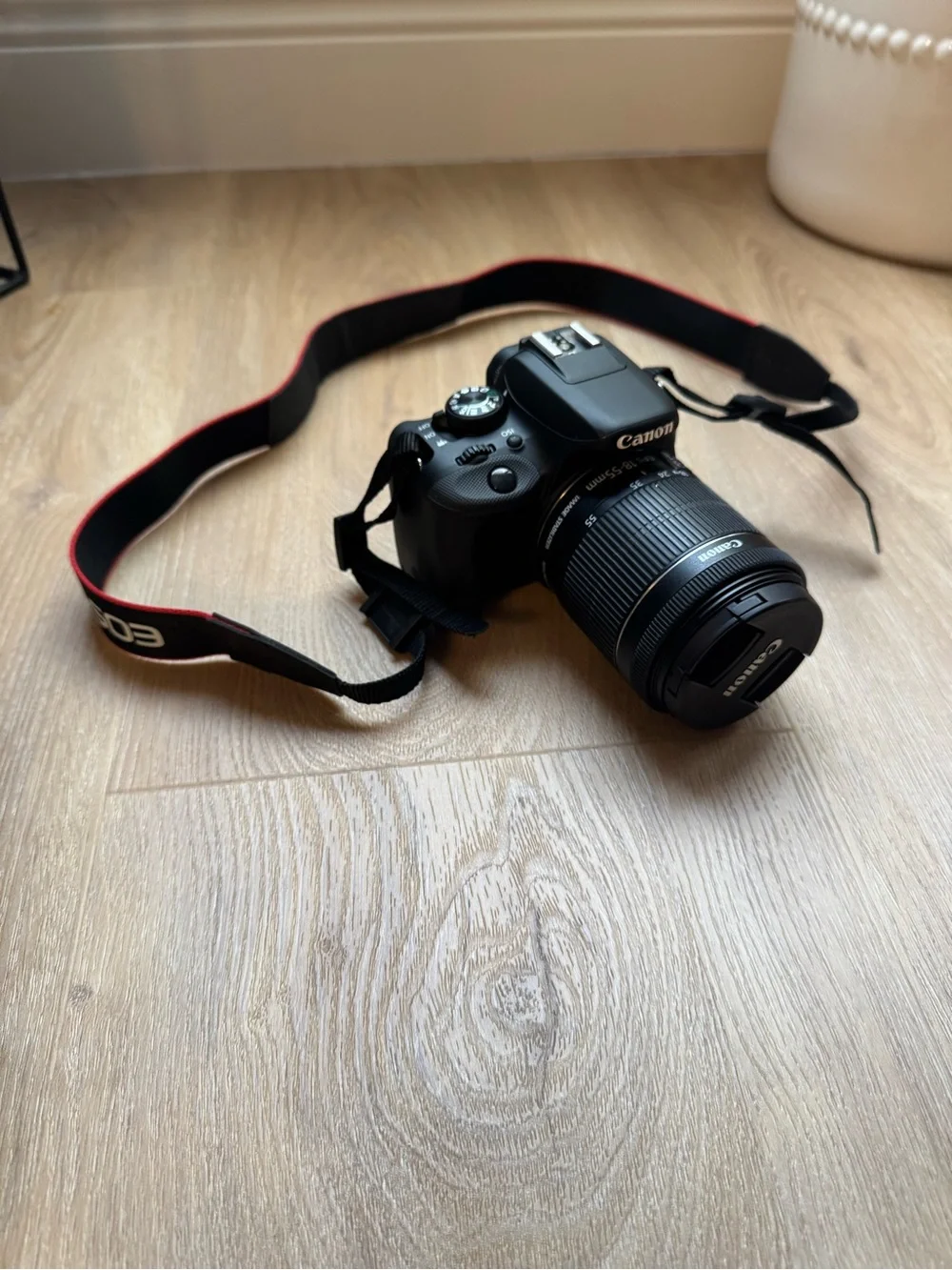 Canon DSLR Camera in Black with Black Zoom Lens